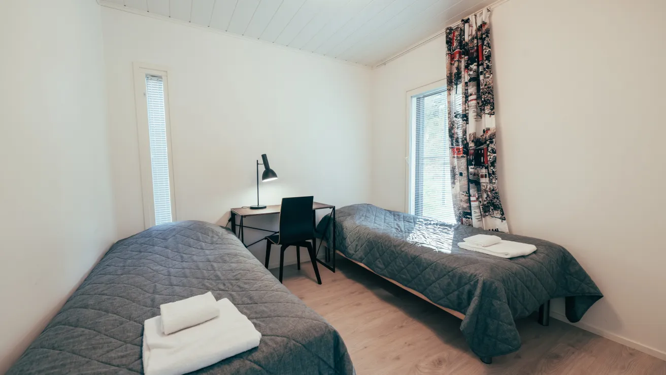 Kisakallion Villa Kallion yksi kotoisista makuuhuoneista.