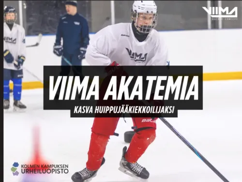 Hockey player on ice, wearing red pants and white jersey.